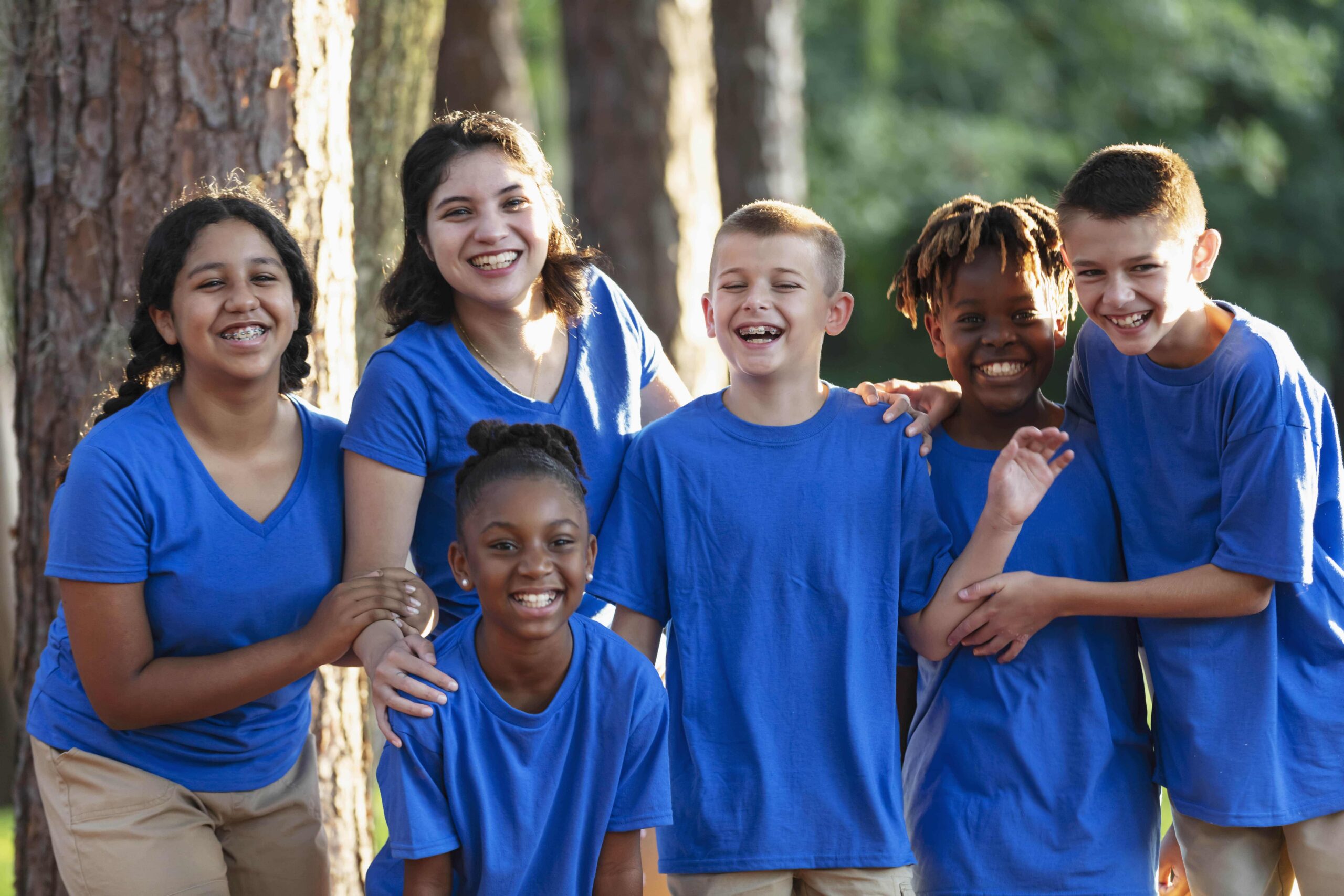 Group of Kids in Blue Shirts.